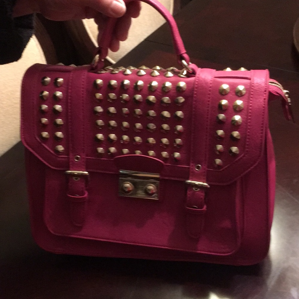 Litzy Ali tote more of a fuchsia color than pink